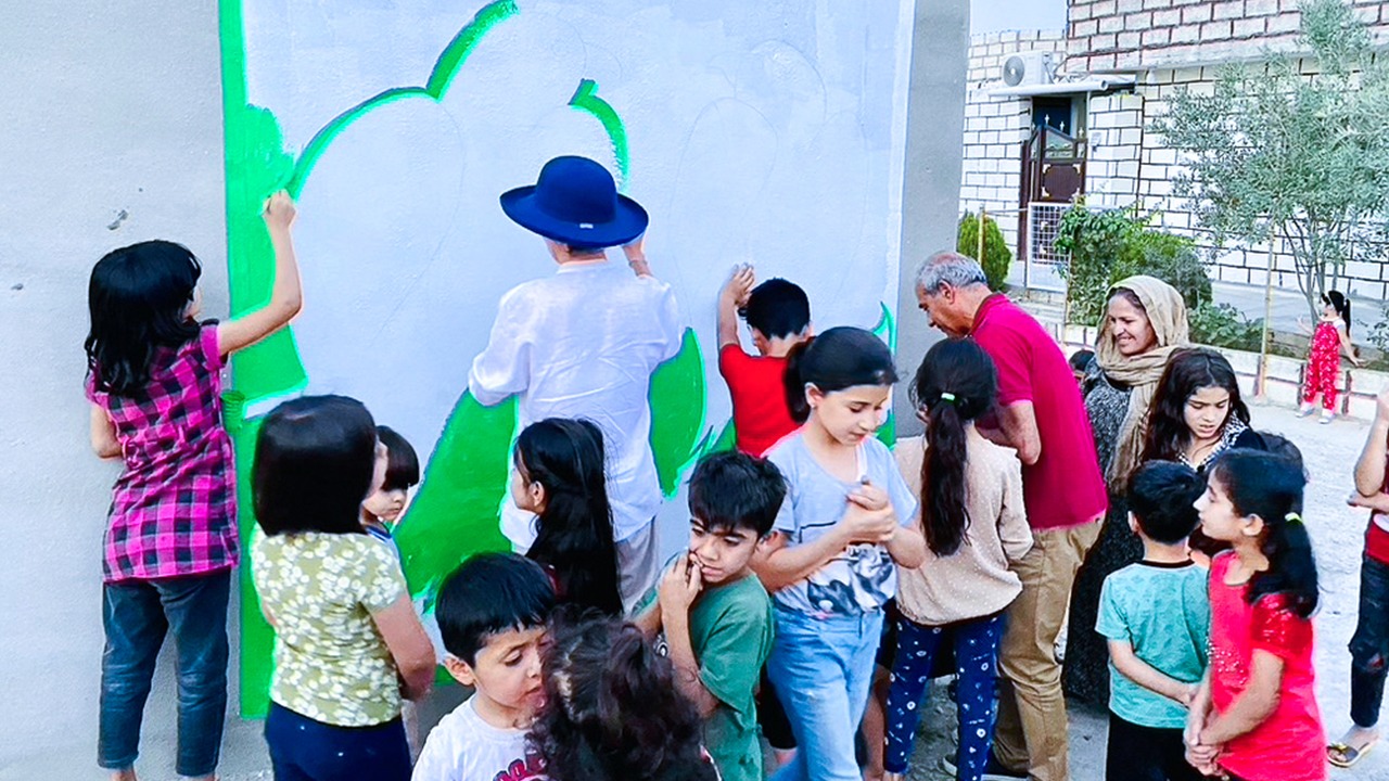 RESTORING LOST HOPE: AN ARTIST UPLIFTS A REFUGEE CAMP 